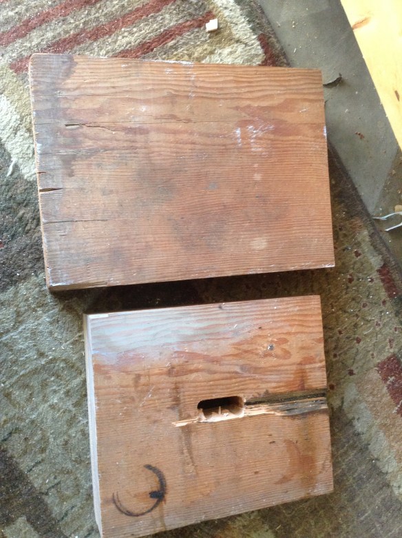 Here is the raw wood I began with. It's at least 50 years old and very heavy and dense. The piece on the bottom is one of the legs. I thought I was going to have the trestle go through the legs at first. I drilled the holes and then chiseled out the wood. I thought, "this isn't that hard." Then I flipped the board over and noticed that I'd split the wood from trying to do all of the chiseling from on side. I should have gone halfway down, then flipped the board over and repeated. Oops. Argh. Damn.