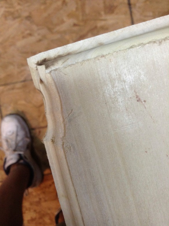 This was the most heartbreaking mistake I made. And I almost gave up. I was tired and impatient and decided to use the router by hand and not on the router table. Oops, big slip. Edge ruined. Goodbye overlay door, hello inset door. That's right. I cut off an equal amount from each side and a little off the top and made it fit inside the closet opening.